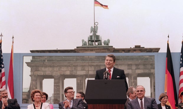 US President Ronald Reagan, commemorating the 750th anniversary of Berlin, addresses on June 12, 1987 the people of West Berlin at the base of the Brandenburg Gate, near the Berlin wall.