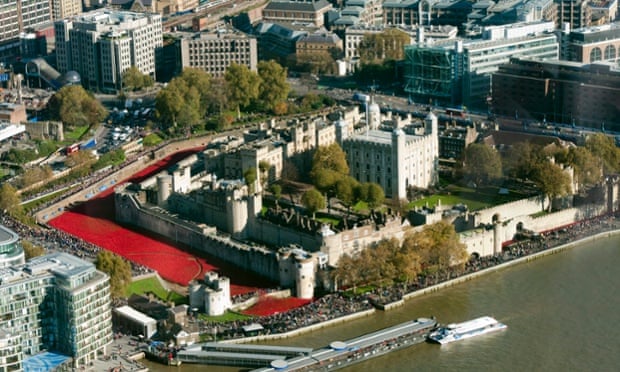 London, UK An aerial view from The Shard of visitors looking at Tower of London's 'Blood swept Lands and Seas of Red' poppy installation by artist Paul Cummins at the Tower of London