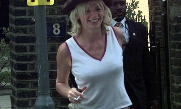 Zoe Ball on her way to her wedding holding a bottle of Jack Daniel's