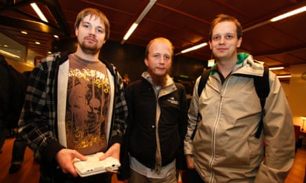 Pirate Bay co-founders Fredrik Neij (L), Gottfrid Svartholm (C) and Peter Sunde leave the city court after their copyright trial in Stockholm, 2009.