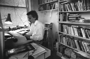 Martin Amis, working on a novel in April 1990