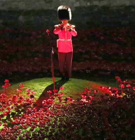 The Last Post at the opening of the Blood Swept Lands and Seas of Red artwork by Paul Cummins at the Tower of London.