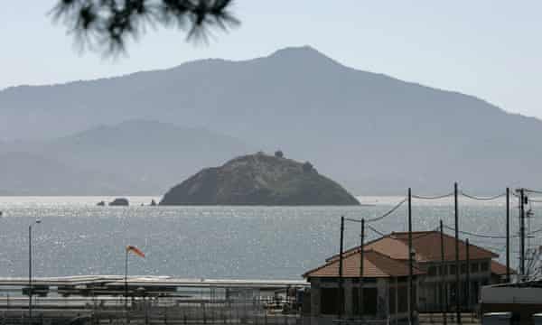 Red Rock Island with Mt. Tamalpais in the background is seen in this view taken from Point Richmond, Calif chevron refinery
