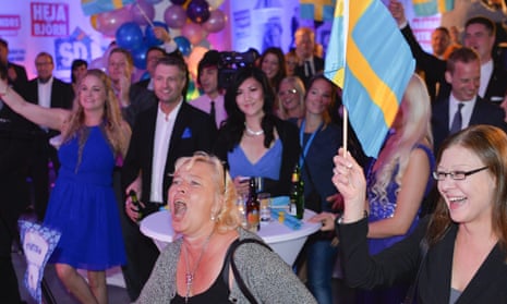 People celebrate at the election night party of the far-right Sweden Democrats in Stockholm, Sweden, after first exit polls indicate that the party will be third largest in the Swedish parliament after the Swedish general elections on September 14, 2014