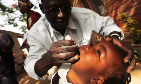 A Nigerian schoolgirl is vaccinated against polio 