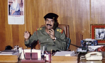 Saddam Hussein, at his writing desk?
