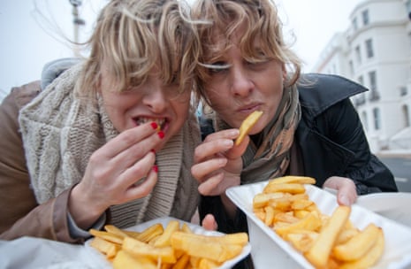 Women eating chips