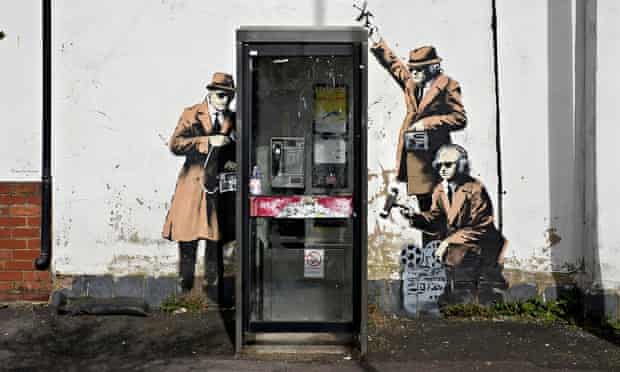 Banksy spy booth mural