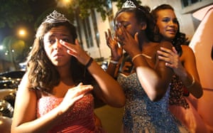Girls are overwhelmed with emotion as they arrive at the ball