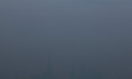 Industrial pollution from Europe and dust from the Sahara region creates a layer of smog over the City of London. Barely visible through the poplluted air, the buildings seem to disappear into the poor air quality. Here the city is virtually invisible from Crystal Palace on 2 April 2014.