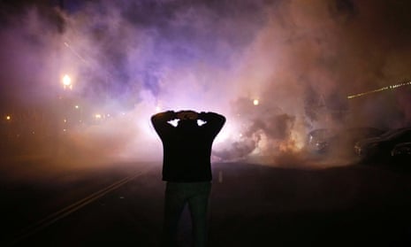 Cloud of tear gas nears protester 