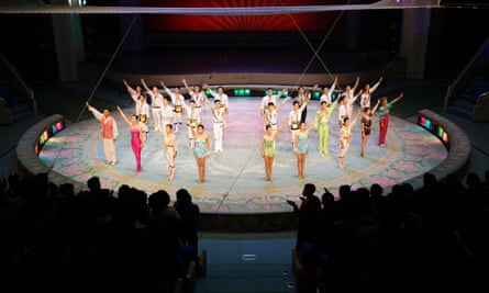 Performers salute the applauding audience at the end of their show at the Pyongyang Circus. North Korea
