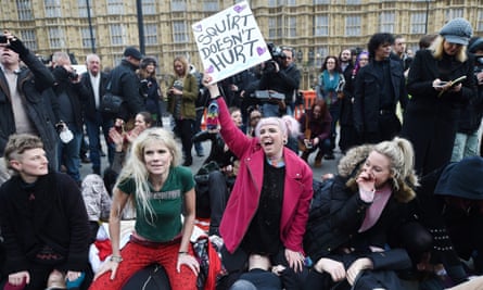 Face-sitting protest outside parliament against new porn rules |  Pornography | The Guardian