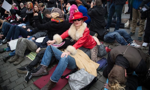 Face-sitting protest outside parliament in London