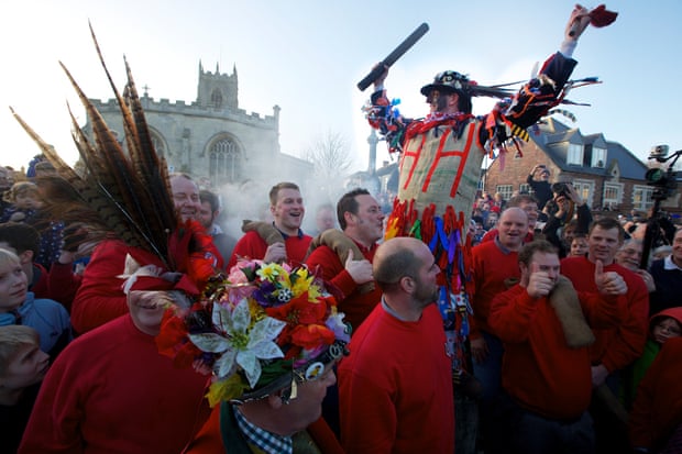 Smoking the Fool … a fire is lit under the Fool who makes a welcome speech before officially starting the Haxey Hood.