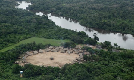 An aerial view of the Bacaja indigenous tribe, of Chicrin ethnicity, on the Bacaja river banks, an affluent of the Xingu river, 220 km (137 miles) outside Altamira, northern Brazil April 29, 2010. After nearly three decades of sometimes violent protests, about 1,000 other indigenous people in the remote region have resigned themselves to the fact that the world's third-largest dam will be built in their backyard. Supporters say the Belo Monte dam will create jobs in a downtrodden region and help power Latin America's largest economy but critics say the race for economic prosperity also brings social and environmental costs.