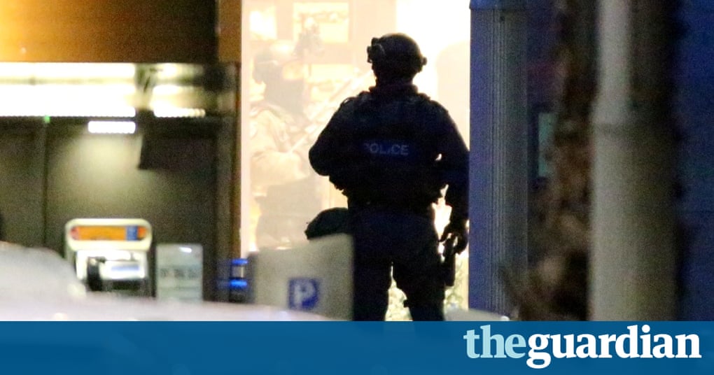 Sydney siege: Martin Place cafe stormed by police after gunfire