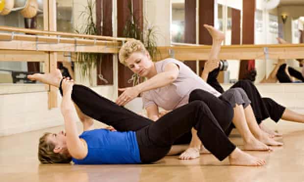 Women doing yoga exercises
