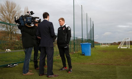 Howe takes time out to give a TV interview