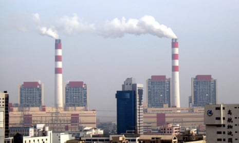 Smoke is seen emitted from chimneys at the Waigaoqiao coal-fired power plant in Pudong, Shanghai, China, 3 December 2008.