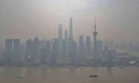 A general view of Pudong Lujiazui Financial District in heavy smog is seen on October 16, 2014 in Shanghai, China. A report from Shanghai Environmental Monitoring Center said that the AQI (Air Quality Index) reached to high 211 in the morning which is serious pollution and fell to 178 in the afternoon to moderate pollution.