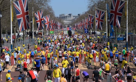 Done and dusted: runners recover on the Mall during the London Marathon  2013 