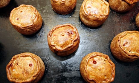 Pork pies on a baking tray