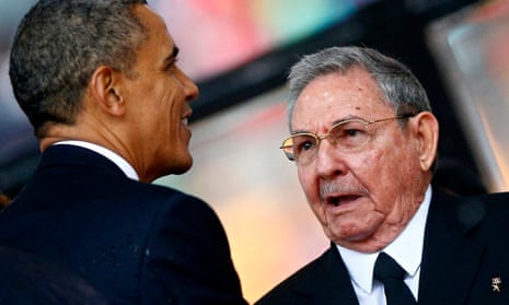 Obama greets Raul Castro at tNelson Mandeal memorial
