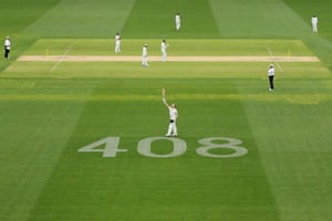10 December: During the first Test between Australia and India at Adelaide Oval, Steve Smith of Australia celebrates his century next to the number 408 displayed as a tribute to the late Phillip Hughes who was the 408th Test player for Australia and who died after being struck by a cricket ball