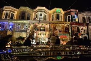 People enjoy the Christmas lights on 34th Street in the Hampden community of Baltimore, Maryland. The display called ‘Miracle on 34th Street’ dates back to 1947 and attracts thousands of tourists each year