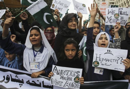 Pakistani students chant slogans to condemn the  Taliban attack on the military-run school in Peshawar.