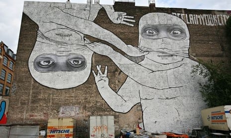 One of the two murals in Kreuzberg by Italian artist Blu.