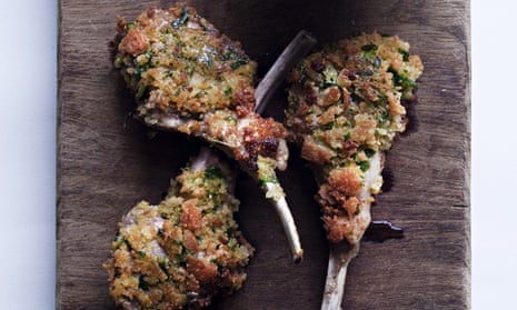 Crumbled lamb chops with roquefort recipe on wooden boarddd