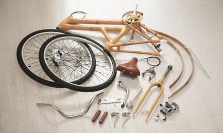 Parts of the Bamboo Bee build-it-yourself bicycle laid out on the floor