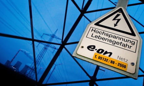 A sign reading 'High voltage Danger to Life' and the logo of energy company Eon at a power line near the cole-fired power plant of Mehrum in Hohenhameln, near Hanover, Germany, 1 December 2014. According to news reports, Eon plans to change its company strategy. The Germany-based energy giant wants to focus on renewable energy, energy networks and customer solutions, and intends to get rid of the nuclear, coal and gas energy divisions.