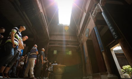 HUANGSHAN, CHINA - JUNE 12: Tourists visit an ancient house on June 12, 2014 at Hongcun Village, China.