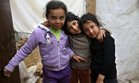 Syrian refugee girls at a refugee camp in Al-Faour, eastern Lebanon. Syrian refugees in Lebanon reac
