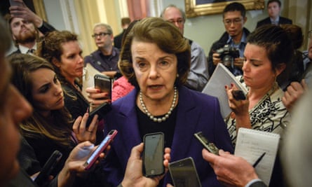 Senator Diane Feinstein talks with reporters on the release of the Senate CIA report on 9 December.