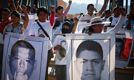 Relatives of missing Mexican students demonstrate to demand that the government finds out what happe