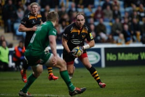 Andy Goode, the Coventry born fly-half, darts inside ...