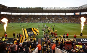 Wasps captain James Haskell leads his team out for kick off.
