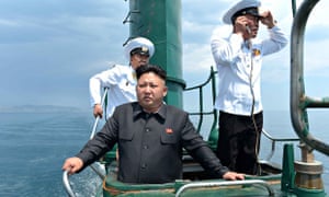 Kim Jong-un inspects a submarine. Photograph: Kns/AFP/Getty Images
