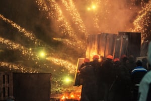 Ukrainian protesters launch a fire attack on police in Grushevsky Street, Kiev, on 22 January.