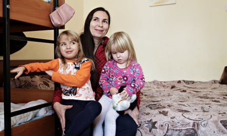 Ukrainian businesswoman Oksana Kolyada, 35, with the daughters