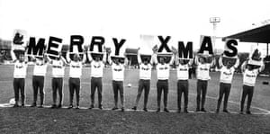 Leeds United players wish their fans a Merry Christmas on the pitch at Elland Road in 1973