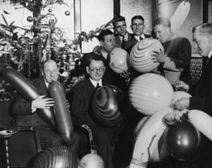 Directors and players of the Liverpool FC preparing for their Christmas party in 1936