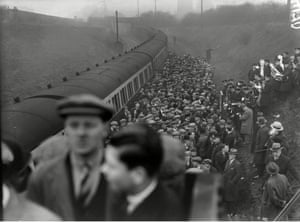 Football fans arrive at the newly-opened Hawthorns Halt station for the West Bromwich Albion v Birmingham City match at the Hawthorns on Christmas Day 1931