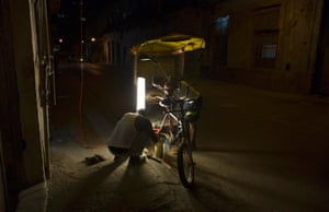 Havana, Cuba Bicycle taxi drivers fix their vehicle downtown. From bus drivers to bartenders and ballet dancers, many Cubans are already imagining a more prosperous future after the United States said it will put an end to 50 years of conflict with the communist-run island