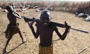 Ilemi Triangle, East Africa Turkana boys play with rifles in a village inside the disputed region claimed by South Sudan and Kenya, bordering also Ethiopia. The dispute arose from unclear wording of a 1914 treaty which tried to allow free movement of the Turkana people, nomadic herders who had traditionally grazed the area
