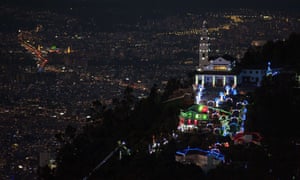 Bogotá, Colombia The sanctuary of the Basilica of the Fallen Lord of Montserrate is illuminated with Christmas lights. Monserrate, a pilgrim destination and tourist attraction, is located on one of highest hills of the city that dominates the city center of the capital